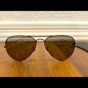 Rayban aviators light gray lense.